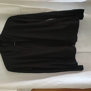 Black cardigan sweater with pockets. Used very good condition.
